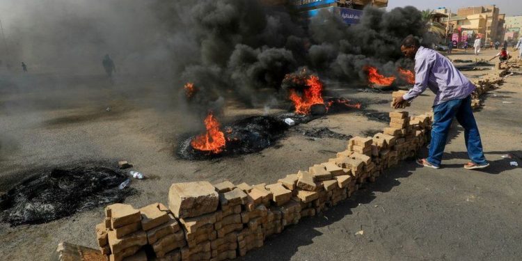 Soldiers storm Sudan’s broadcaster in an apparent coup.