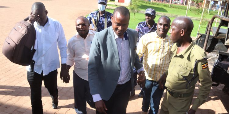 Four District Engineers detained as two CAOs vanish in raid related to theft.