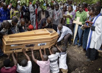 Families bury their dead after Kasese School massacre